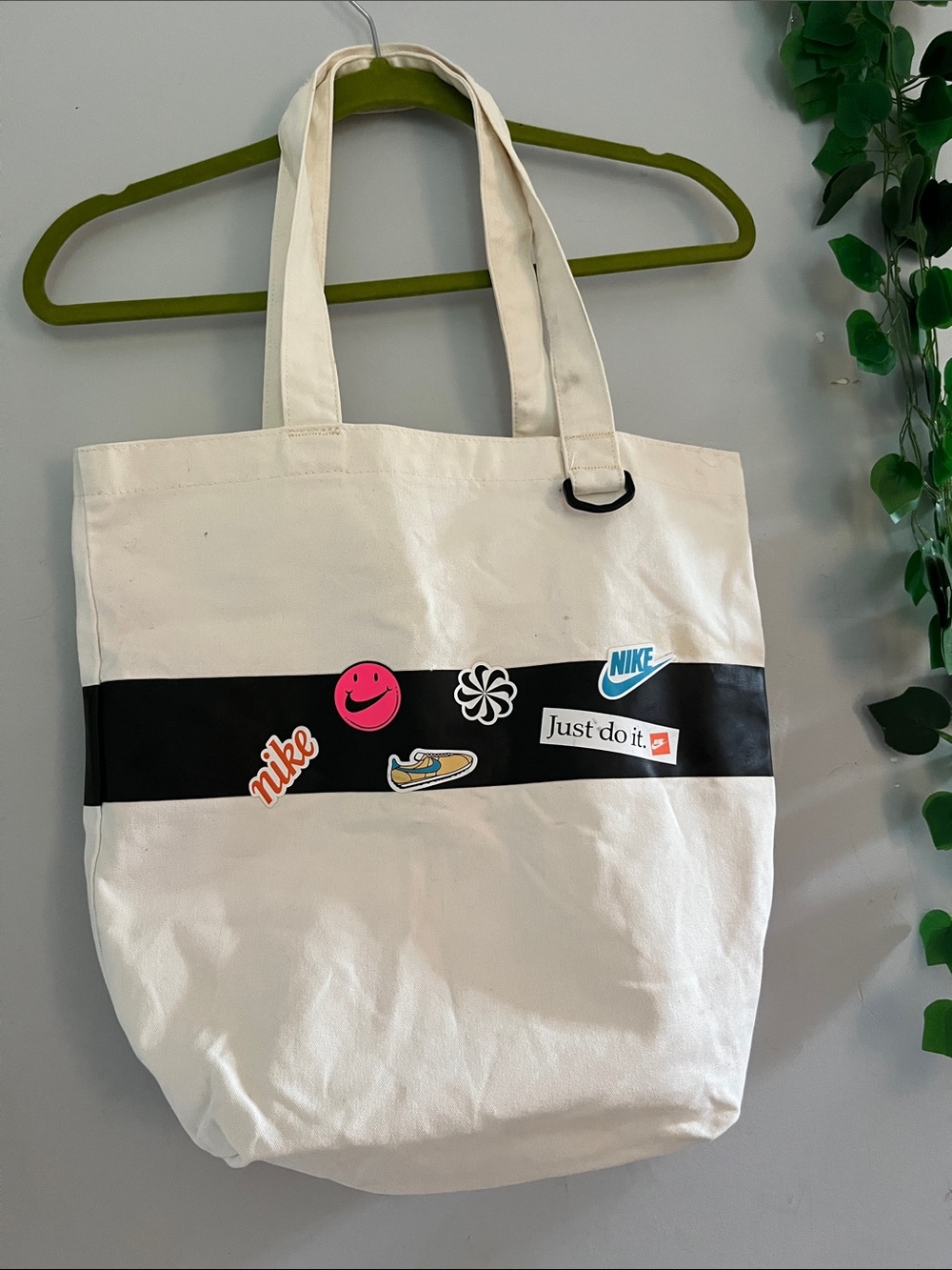 Nike Cream Canvas Tote with Black Stripe and Sticker Accents